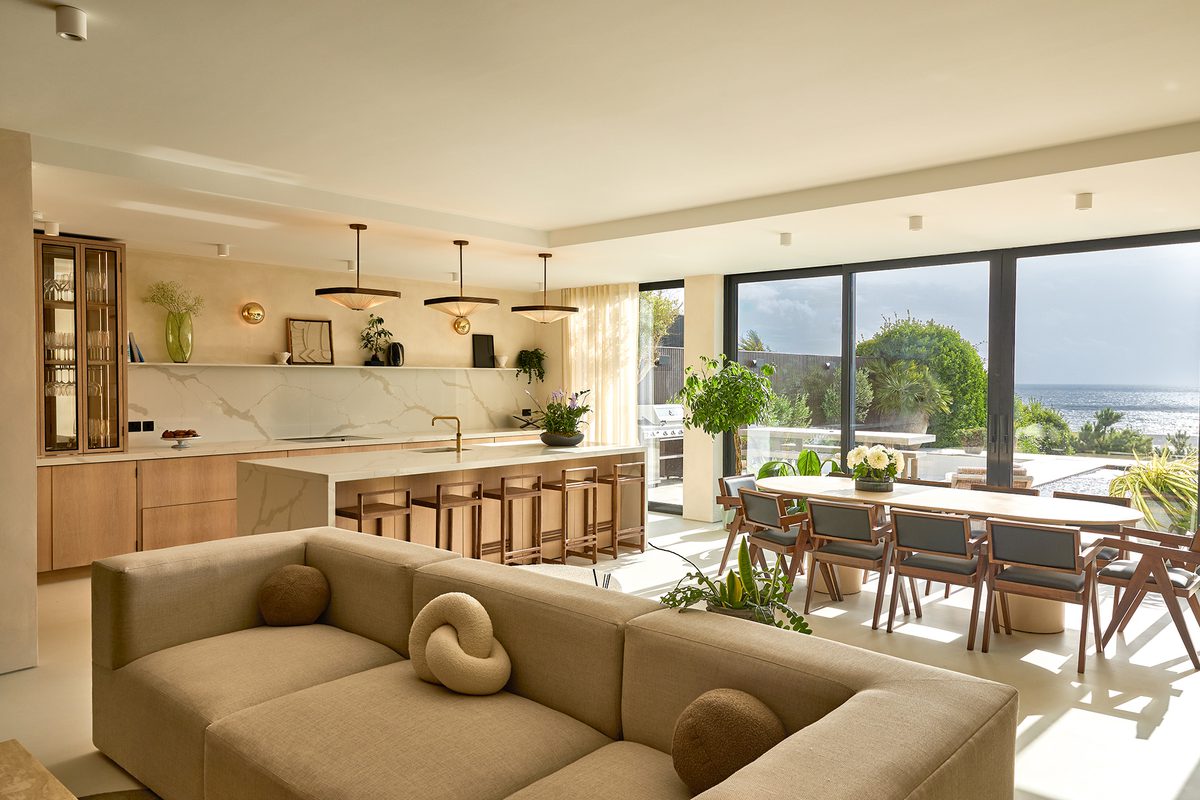 Amira East Sussex open-plan dining area with coastal view