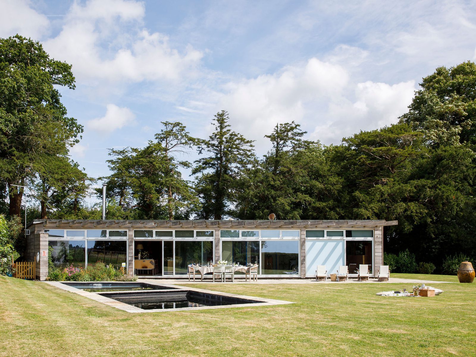 Embers West Sussex modern exterior with lawn